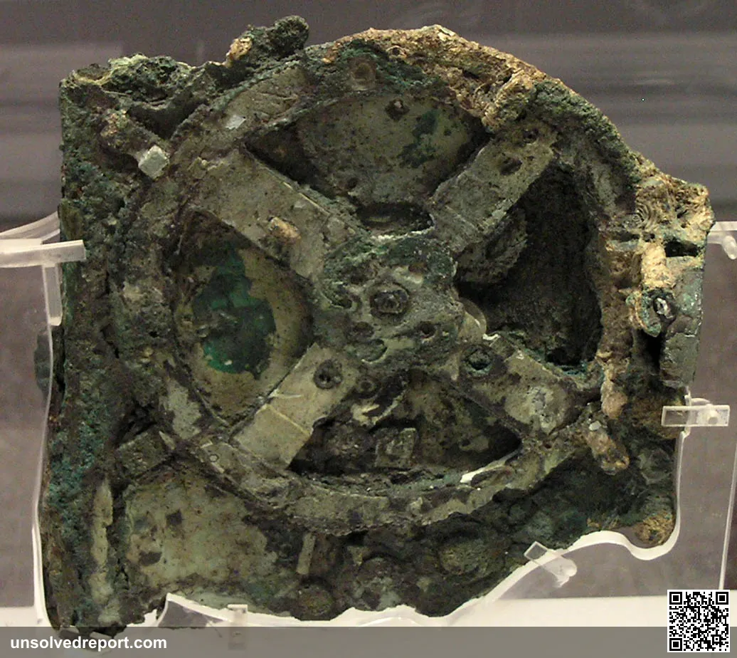 The main fragment of the Antikythera Mechanism, an ancient Greek geared device for predicting astronomical positions, in the National Archaeological Museum, Athens.