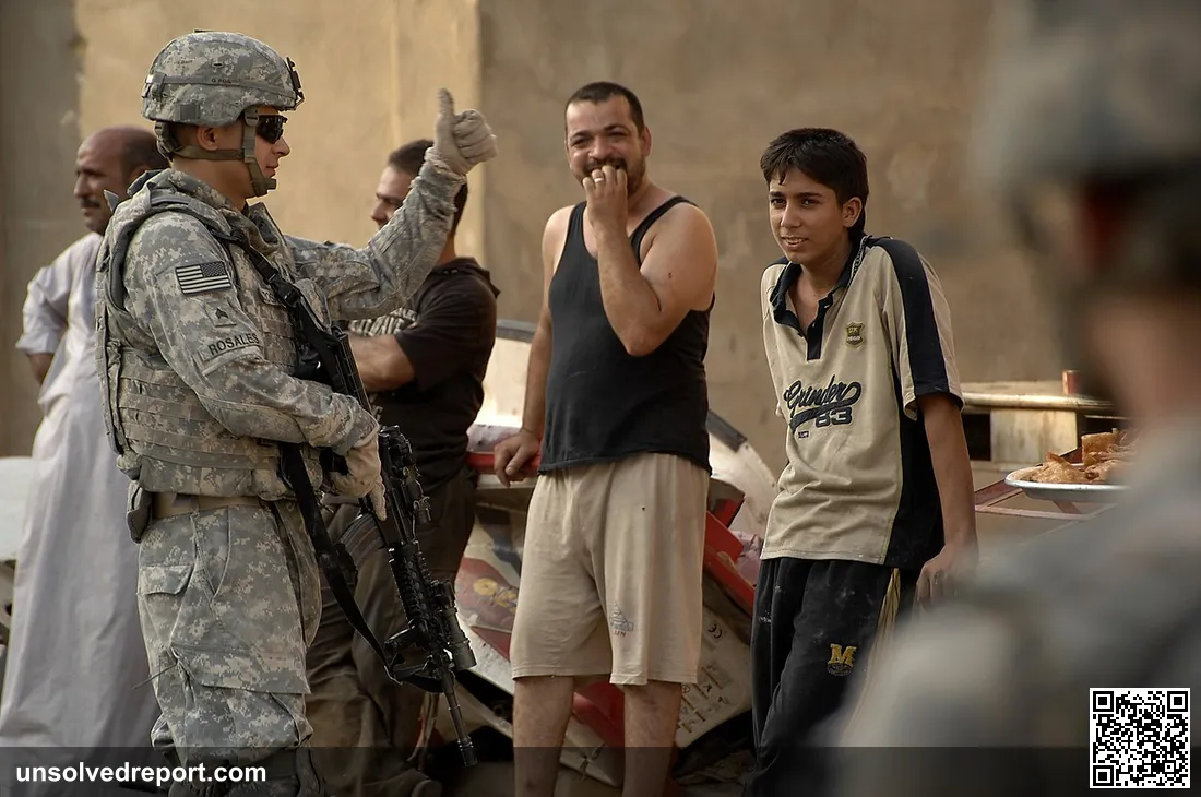 U.S. Army Sgt. Jasin Rosales, a native of Eagle Pass, Texas, gives the "thumbs up" to local residents while on patrol i…