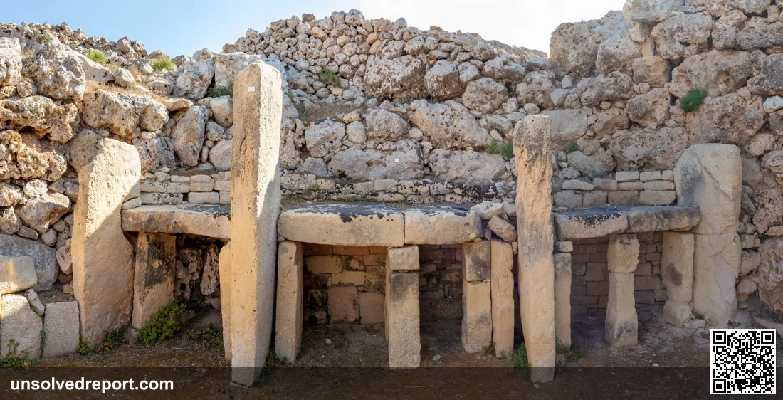 Interior trilithon altars and apse walls inside the Ġgantija temples, Gozo, Malta.