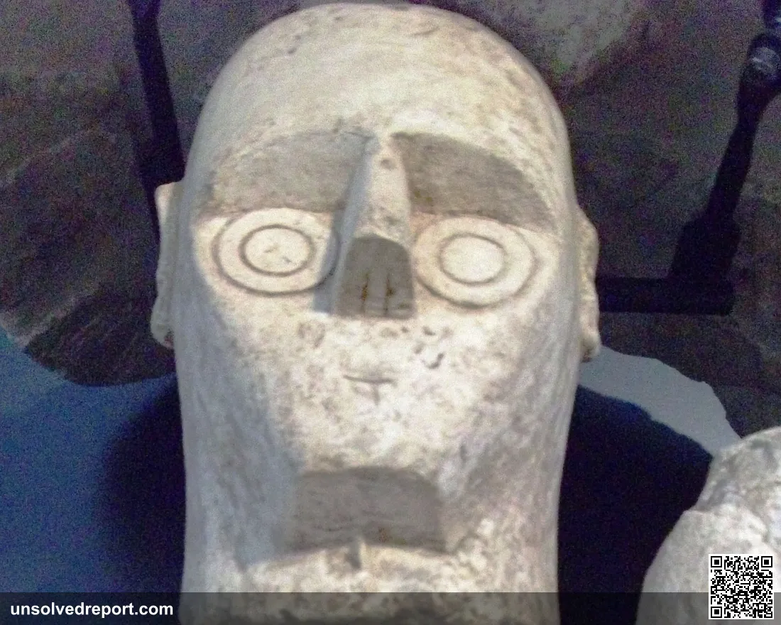 Giant of Mont'e Prama boxer statue face, Nuragic civilization, Sardinia — iconic circular eye carving, Cabras Museum