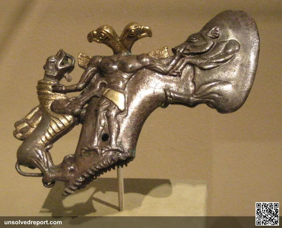 Shaft-hole Axe Head with Bird-Headed Demon, a Boar, and a Dragon figurine. From Central Asia (Bactria-Margiana), late 3…