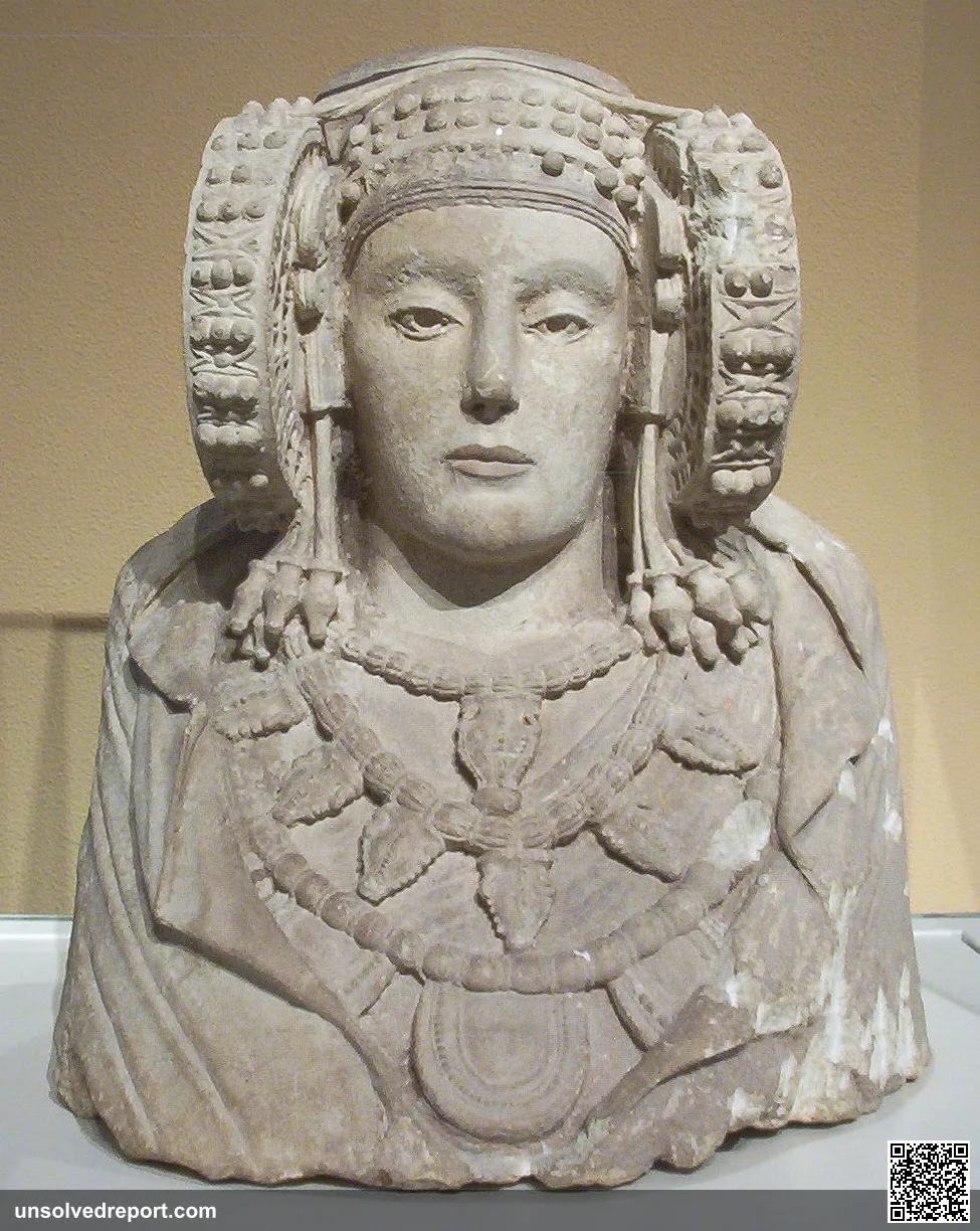 The Lady of Elche, ancient Iberian stone bust with large disc-shaped coils (rodetes) headdress, National Archaeological Museum, Madrid.