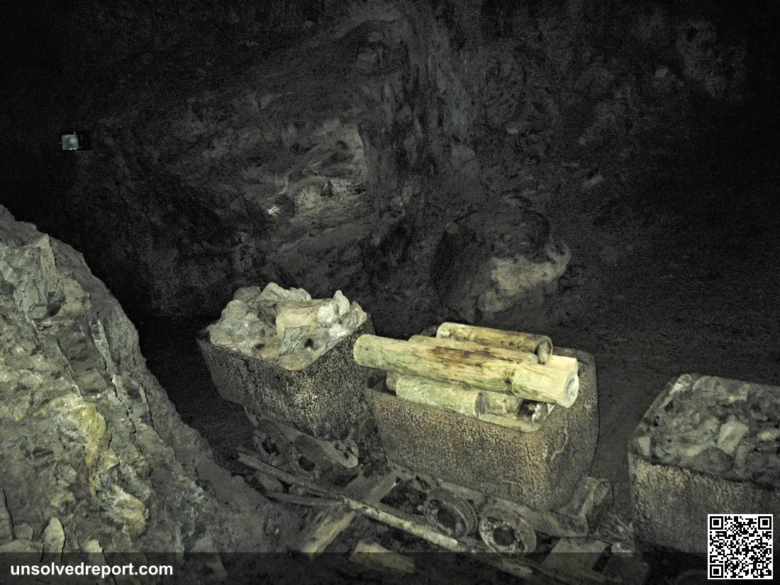 A mine cart on rails inside the Osówka complex of Project Riese, the half-mapped Nazi tunnels at the heart of the gold-train story.