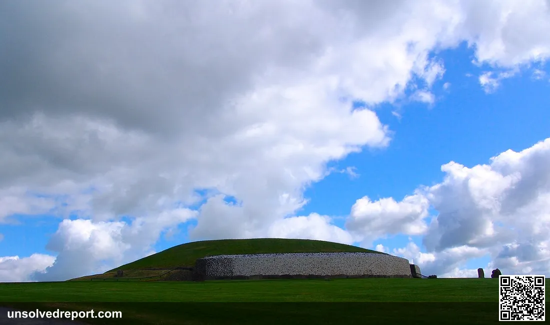 Newgrange passage tomb, County Meath, Ireland — the 5,200-year-old Neolithic monument in the Boyne Valley, viewed from afar showing its distinctive green mound profile