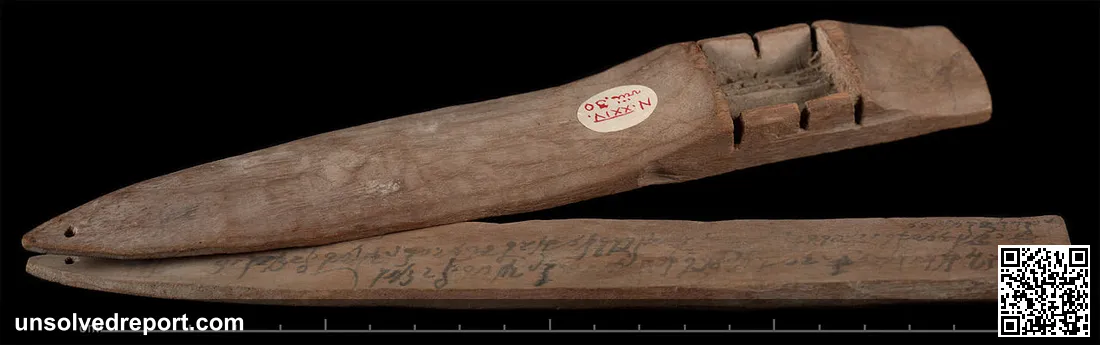 Double-wedged wooden tablet in Gandharan written in Kharosthi script.