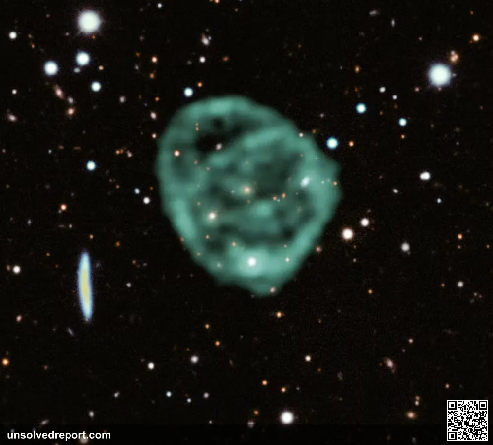Odd radio circle ORC J2103-6200 imaged by the MeerKAT radio telescope (green), overlaid on an optical view from the Dark Energy Survey.