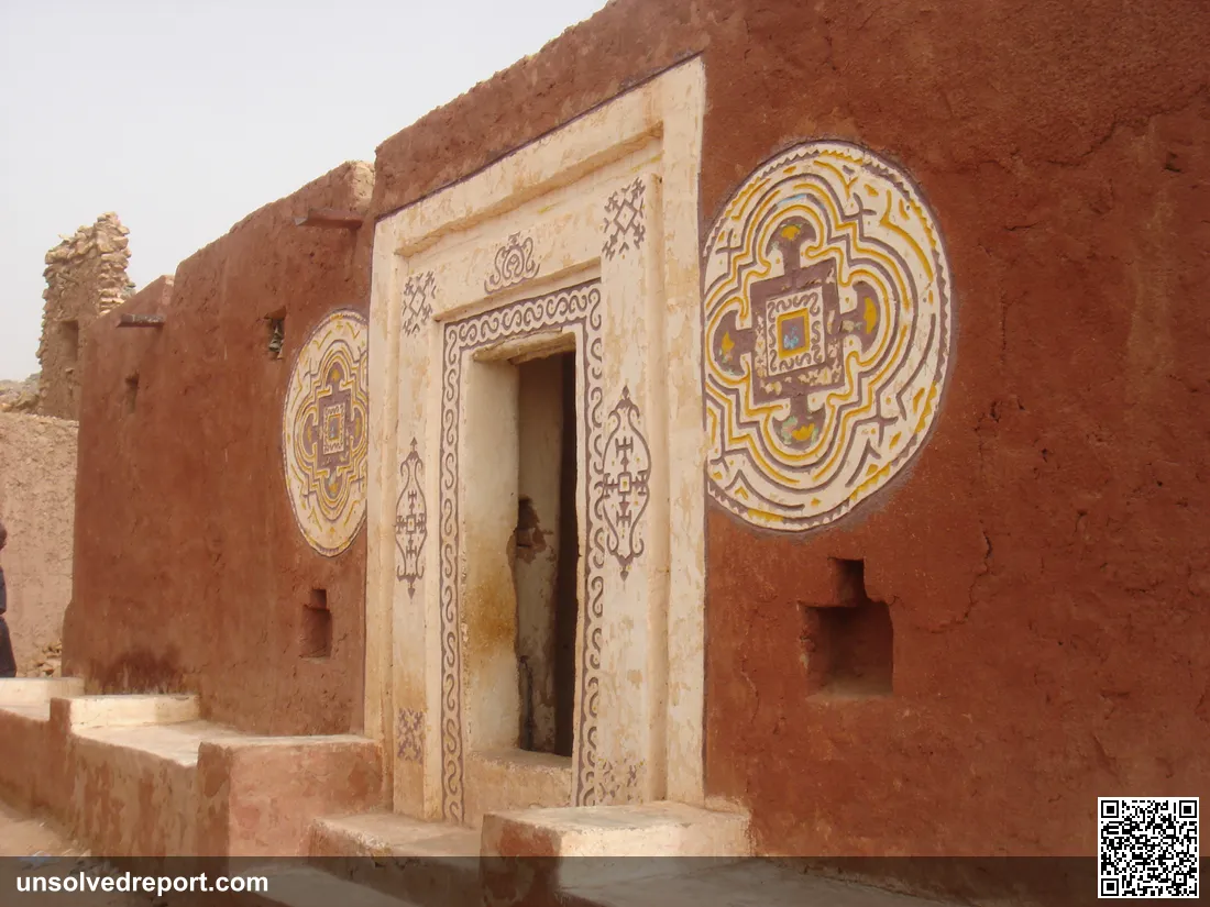 Decorative painted entrance in Oualata, Mauritania, showing the distinctive geometric wall art applied by local women