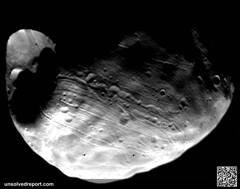 Viking 1 Orbiter global view of the Martian satellite Phobos. The 10 km diameter Stickney crater is at the left, center…