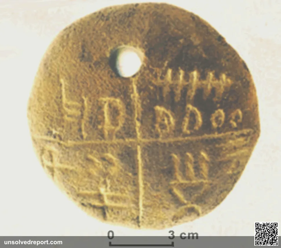 Neolithic tablet amulet, part of the Tărtăria tablets set, dated to 5500-5300 BC and associated with the Turdaş-Vinča c…